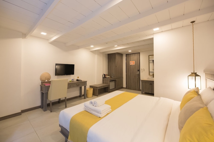 Imagen de la habitación del Hotel Riverside Floral Inn Chiang Mai. Foto 5