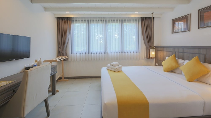 Imagen de la habitación del Hotel Riverside Floral Inn Chiang Mai. Foto 11