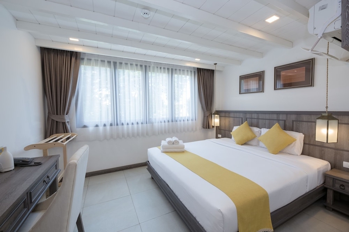 Imagen de la habitación del Hotel Riverside Floral Inn Chiang Mai. Foto 12
