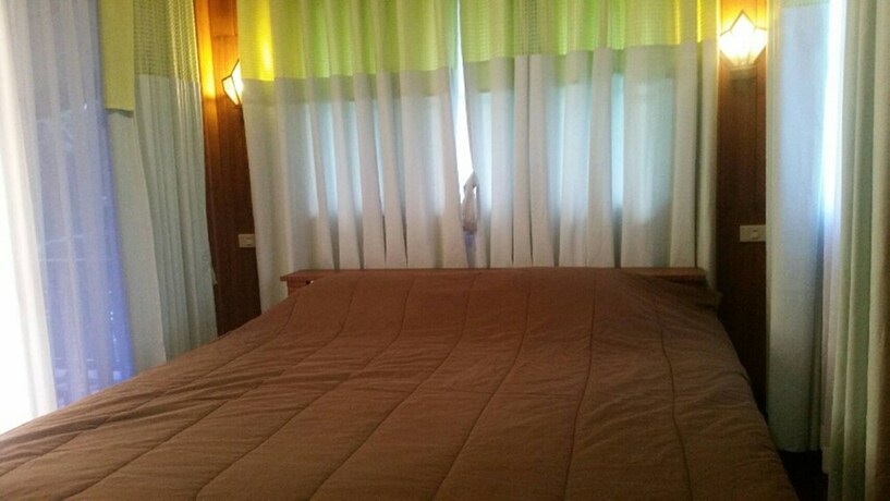 Imagen de la habitación del Hotel Riverside Home. Foto 21
