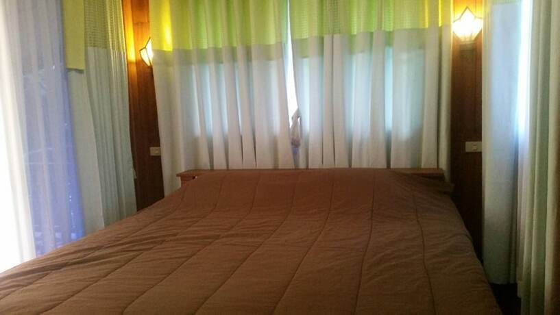 Imagen de la habitación del Hotel Riverside Home. Foto 23