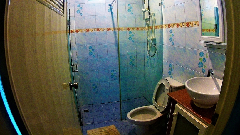 Imagen de la habitación del Hotel Riverside Homestay. Foto 12