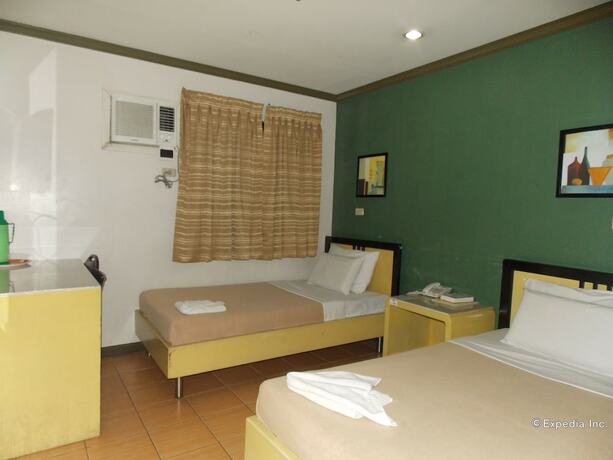 Imagen de la habitación del Hotel Riverside Inn, Iloilo. Foto 13