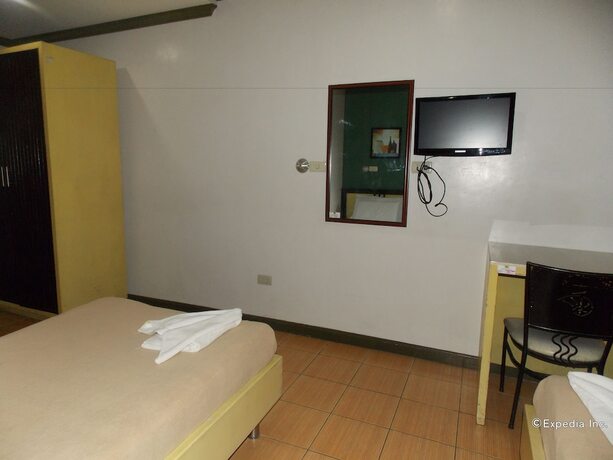 Imagen de la habitación del Hotel Riverside Inn, Iloilo. Foto 14