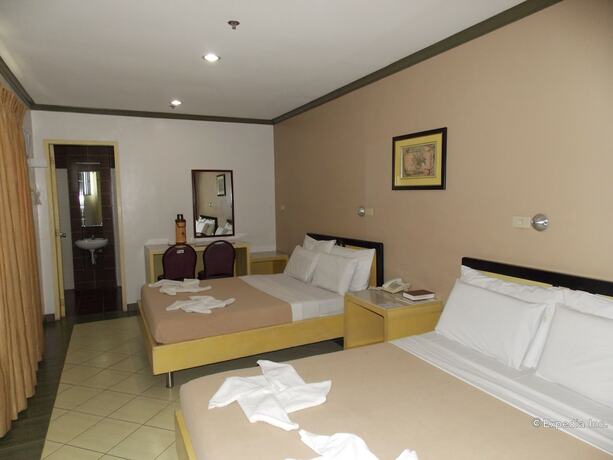 Imagen de la habitación del Hotel Riverside Inn, Iloilo. Foto 15