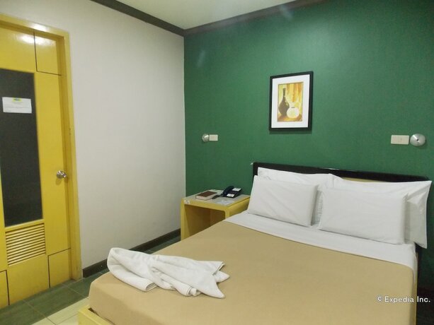 Imagen de la habitación del Hotel Riverside Inn, Iloilo. Foto 16