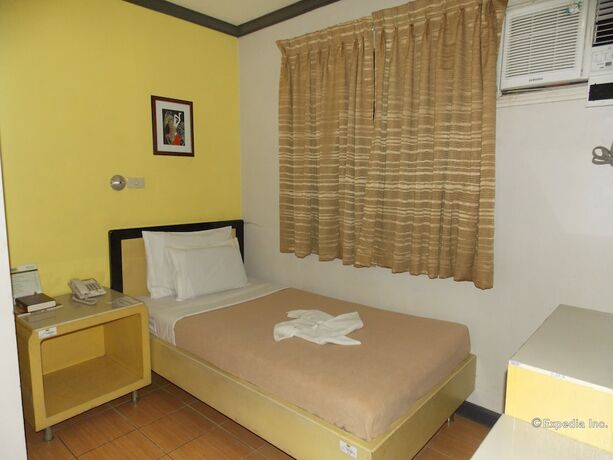 Imagen de la habitación del Hotel Riverside Inn, Iloilo. Foto 18