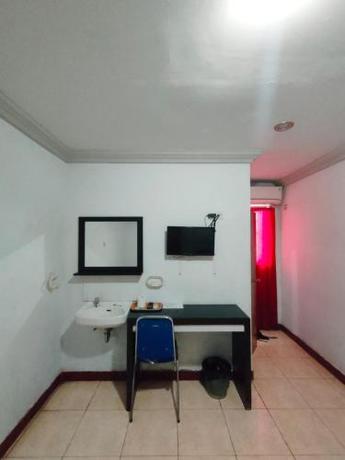 Imagen de la habitación del Hotel Riverside Manado. Foto 19