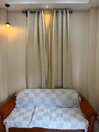 Imagen de la habitación del Hotel Riverside Palm Homestay Guwahati Assam. Foto 7