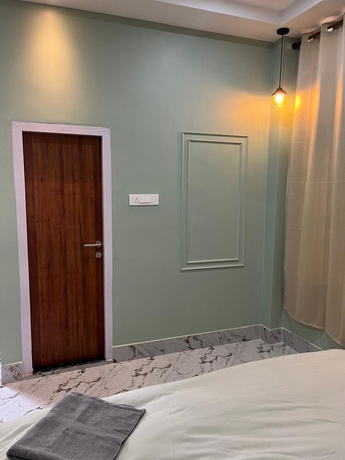 Imagen de la habitación del Hotel Riverside Palm Homestay Guwahati Assam. Foto 9