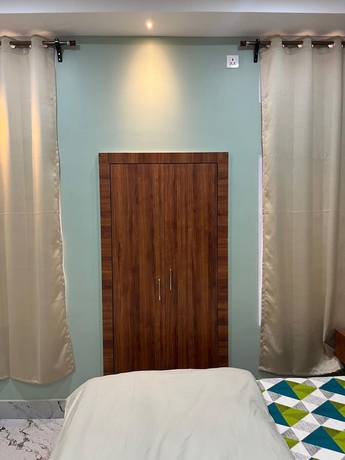 Imagen de la habitación del Hotel Riverside Palm Homestay Guwahati Assam. Foto 10