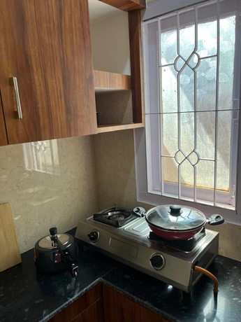 Imagen de la habitación del Hotel Riverside Palm Homestay Guwahati Assam. Foto 15