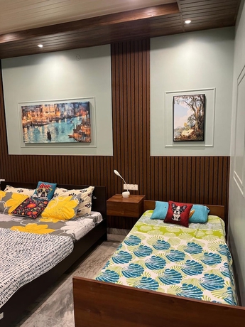 Imagen de la habitación del Hotel Riverside Palm Homestay Guwahati Assam. Foto 16