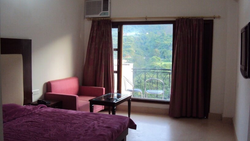 Imagen de la habitación del Hotel Riverside Resort, Pauri. Foto 19
