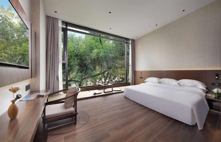 Imagen de la habitación del Hotel Riverside Wing Guilin. Foto 4