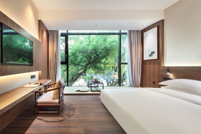 Imagen de la habitación del Hotel Riverside Wing Guilin. Foto 6