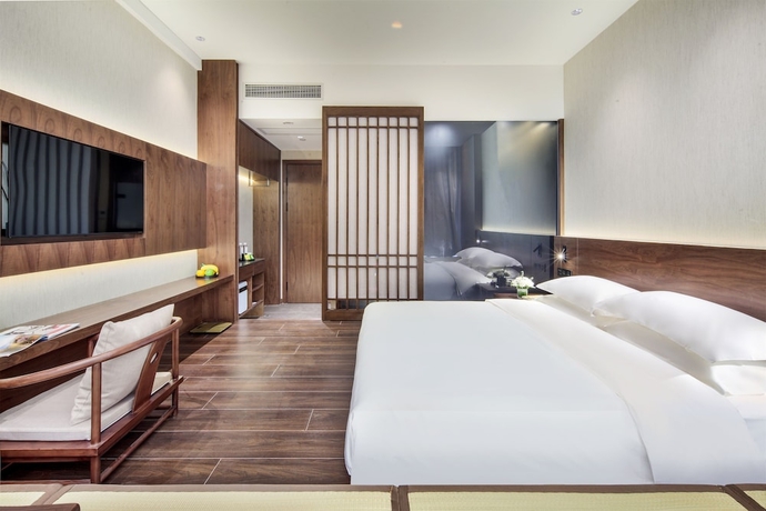 Imagen de la habitación del Hotel Riverside Wing Guilin. Foto 7