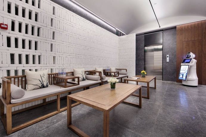 Imagen de los interiores del Hotel Riverside Wing Guilin. Foto 16