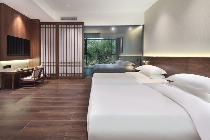 Imagen de la habitación del Hotel Riverside Wing Guilin. Foto 12