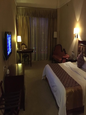 Imagen de la habitación del Hotel Riverside, Zhongshan. Foto 4