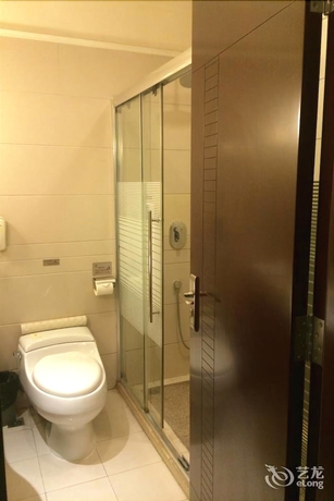 Imagen de la habitación del Hotel Riverside, Zhongshan. Foto 7