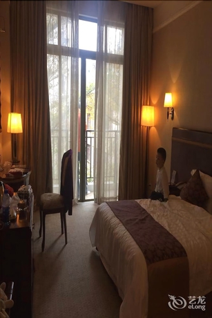 Imagen de la habitación del Hotel Riverside, Zhongshan. Foto 8