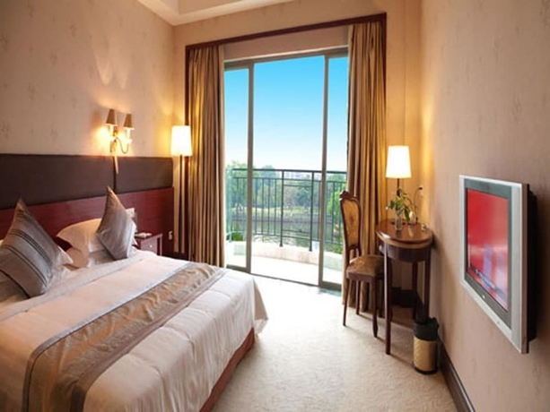 Imagen de la habitación del Hotel Riverside, Zhongshan. Foto 13