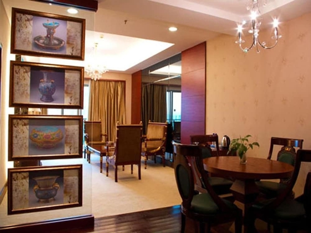 Imagen de la habitación del Hotel Riverside, Zhongshan. Foto 16