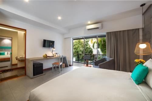 Imagen de la habitación del Hotel Riversoul Boutique. Foto 7