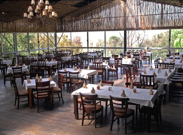 Imagen del bar/restaurante del Hotel Riverstone Lodge, Muldersdrift. Foto 3