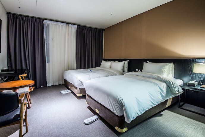 Imagen de la habitación del Hotel Rivertain. Foto 15