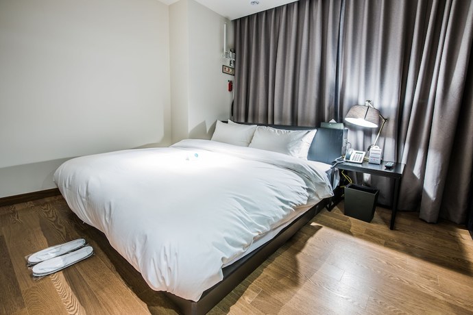 Imagen de la habitación del Hotel Rivertain. Foto 17