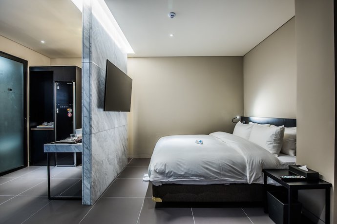 Imagen de la habitación del Hotel Rivertain. Foto 18