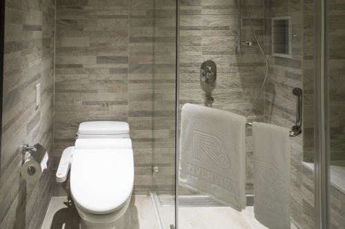 Imagen de la habitación del Hotel Riverview Suites Taipei. Foto 7