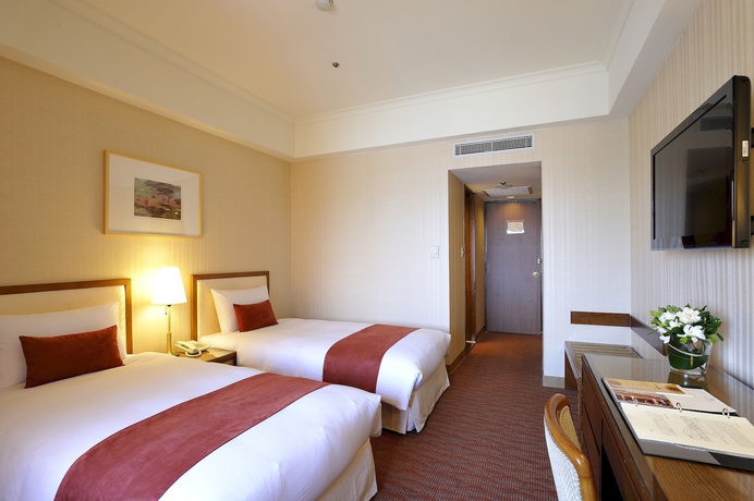 Imagen de la habitación del Hotel Riverview Taipei. Foto 7