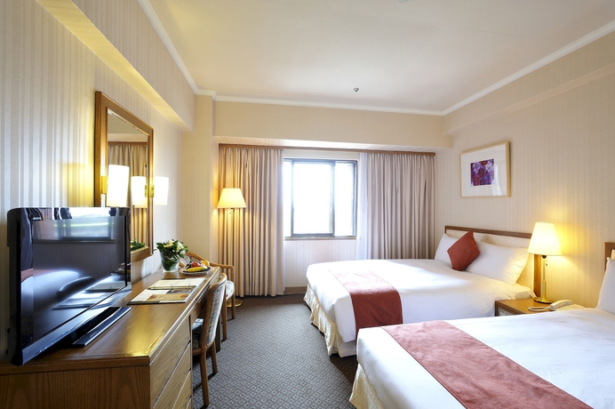 Imagen de la habitación del Hotel Riverview Taipei. Foto 8