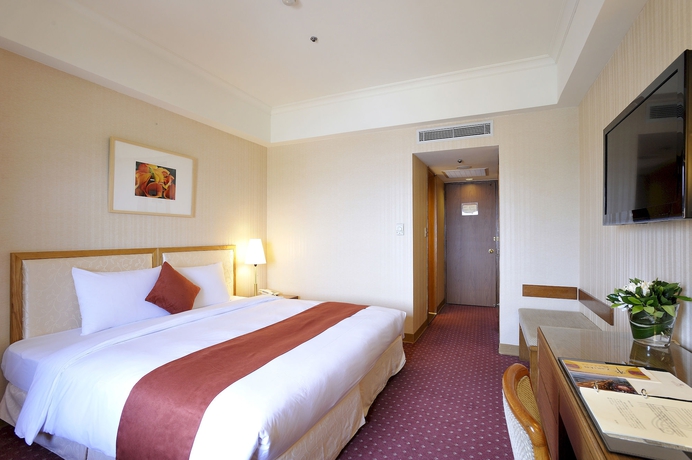 Imagen de la habitación del Hotel Riverview Taipei. Foto 9