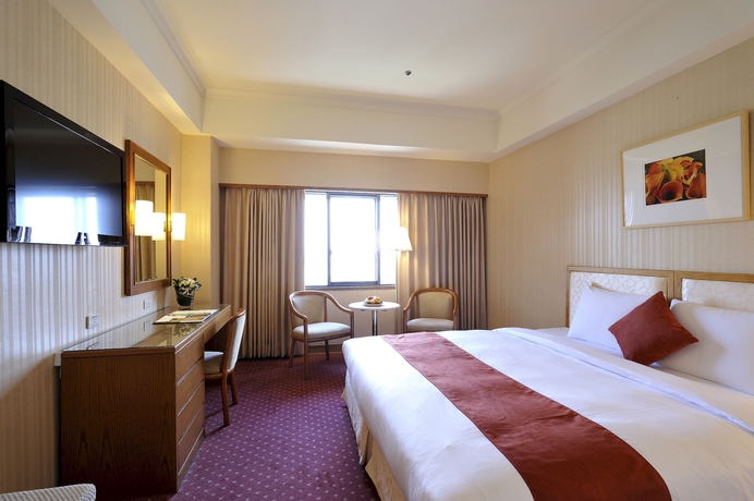 Imagen de la habitación del Hotel Riverview Taipei. Foto 10