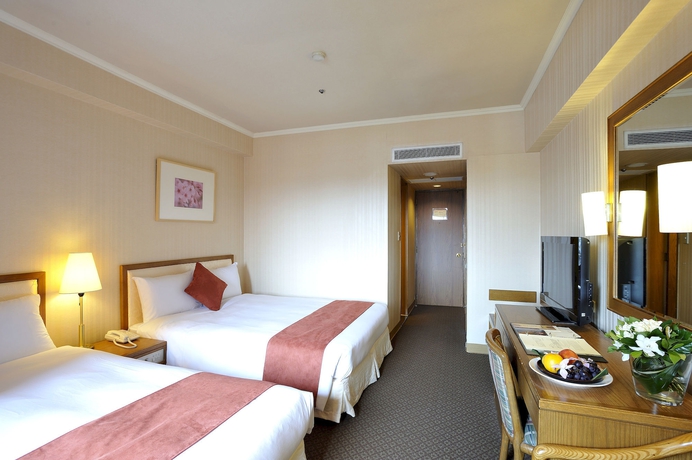 Imagen de la habitación del Hotel Riverview Taipei. Foto 11