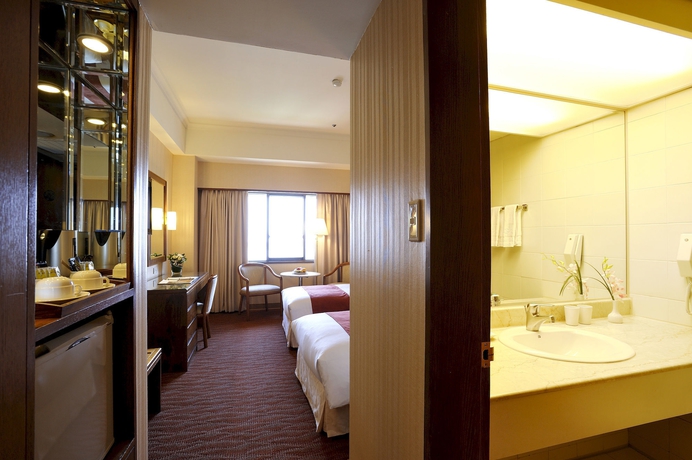 Imagen de la habitación del Hotel Riverview Taipei. Foto 14