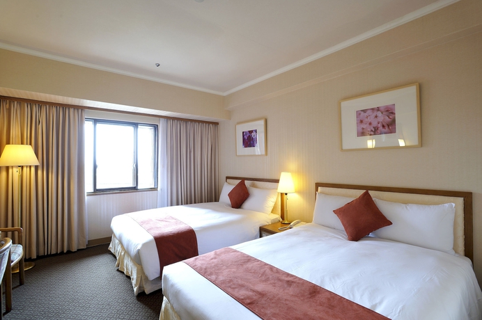 Imagen de la habitación del Hotel Riverview Taipei. Foto 16