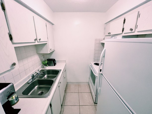 Imagen de la habitación del Hotel Riverwatch. Foto 5