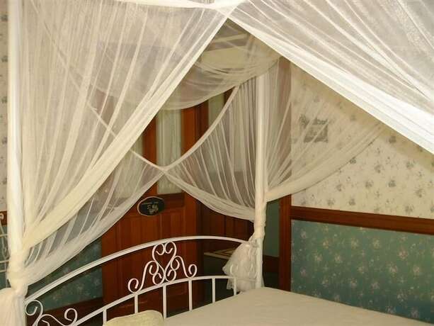 Imagen de la habitación del Hotel Riviera Bed and Breakfast. Foto 17