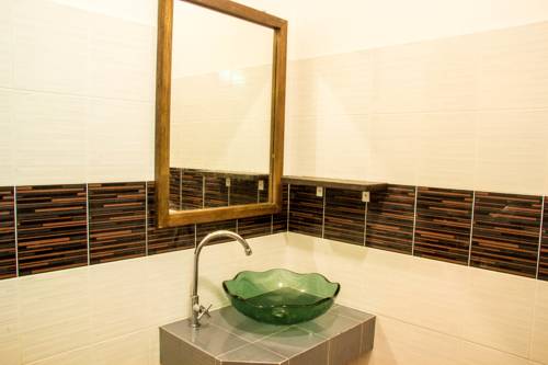 Imagen de la habitación del Hotel Riviera Boutique House. Foto 13
