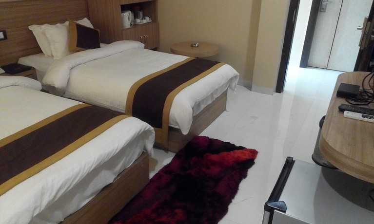 Imagen de la habitación del Hotel Riviera, Dispur. Foto 8