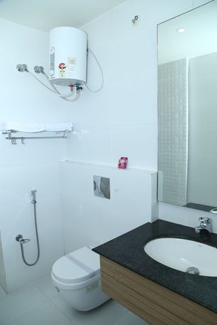 Imagen de la habitación del Hotel Riviera, Dispur. Foto 9