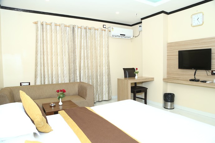 Imagen de la habitación del Hotel Riviera, Dispur. Foto 12