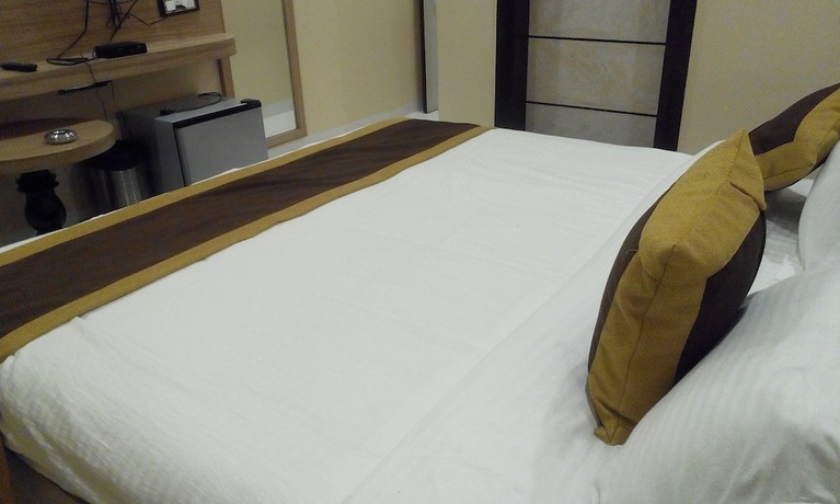 Imagen de la habitación del Hotel Riviera, Dispur. Foto 14