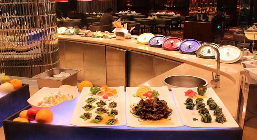 Imagen del bar/restaurante del Hotel Riviera Hotel - Ningbo. Foto 4