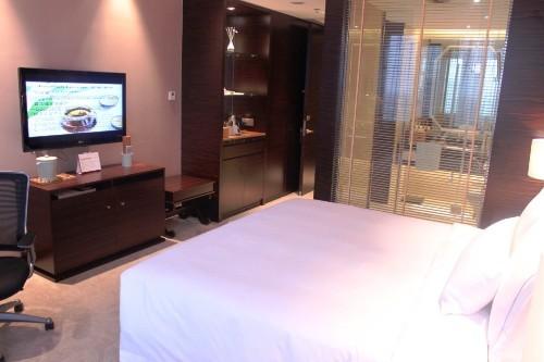 Imagen de la habitación del Hotel Riviera Hotel - Ningbo. Foto 5